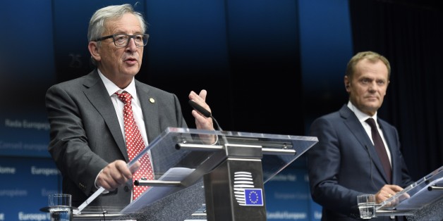 (From L) EU Commission President Jean Claude Juncker and EU Council President Donald Tusk give a press conference at the end of the first of the two days of European Council on June 26, 2015 at the EU headquarters in Brussels. AFP PHOTO / MARTIN BUREAU (Photo credit should read MARTIN BUREAU/AFP/Getty Images)