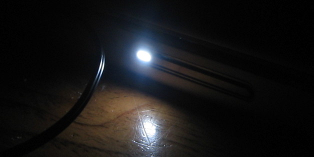 The "sleeping" light on my PowerBook pulsates.
<b>See the rest of the "NIGHT LIGHTS" series at <a href="http://driftingembers.com">Drifting Embers</a>!</b>