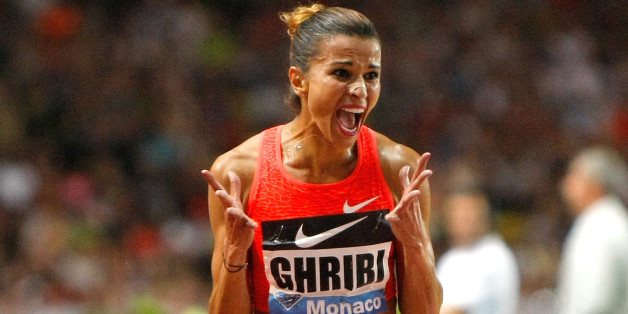 Tunisia's Habiba Ghribi reacts after winning the women's 3000m steeplechase race at the Herculis International Athletics Meeting, at the Louis II Stadium in Monaco, Friday, July 17, 2015. (AP Photo/Claude Paris)