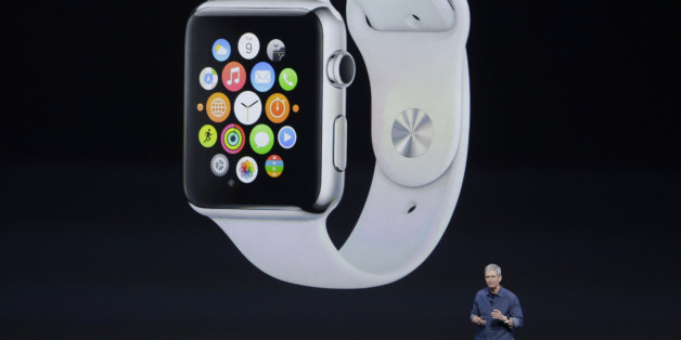 Apple CEO Tim Cook introduces Apple Watch on Tuesday, Sept. 9, 2014, in Cupertino, Calif. (AP Photo/Marcio Jose Sanchez)