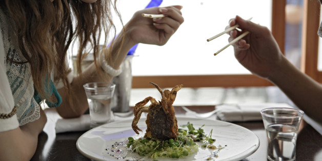 Young couple eating, close-up