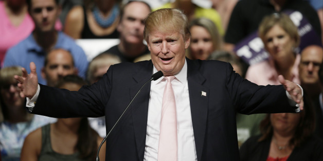 Republican presidential candidate Donald Trump speaks at a rally and picnic, Saturday, July 25, 2015, in Oskaloosa, Iowa. (AP Photo/Charlie Neibergall)