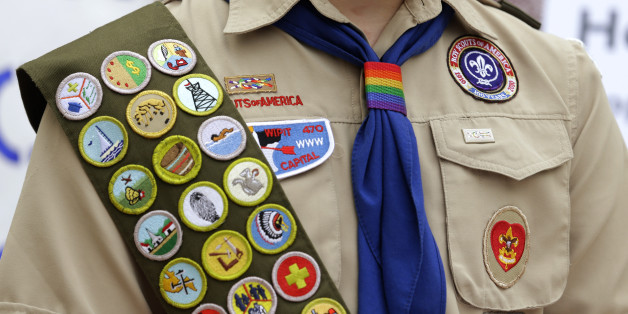 The Boy Scout uniform of Pascal Tessier, 17, a gay Eagle Scout from Kensington, Md., includes his merit badges and a rainbow-colored neckerchief slider, as he speaks in front of a group of Boy Scouts and scout leaders, Wednesday, May 21, 2014, outside the headquarters of Amazon.com in Seattle. The group delivered a petition to Amazon that was started as an online effort by Tessier and gathered more than 125,000 signatures, urging Amazon to stop donating money to the Boy Scouts due to the organiz