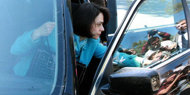Delia Velculescu, head of Troika (IMF), arrives at the presidential palace for a meeting with Cyprus' President Nicos Anastasiades in capital Nicosia, Wednesday, March 20, 2013. Cypriot lawmakers on Tuesday rejected a critical draft bill that would have seized part of people's bank deposits in order to qualify for a vital international bailout, with not a single vote in favor. (AP Photo/Christos Theodorides)