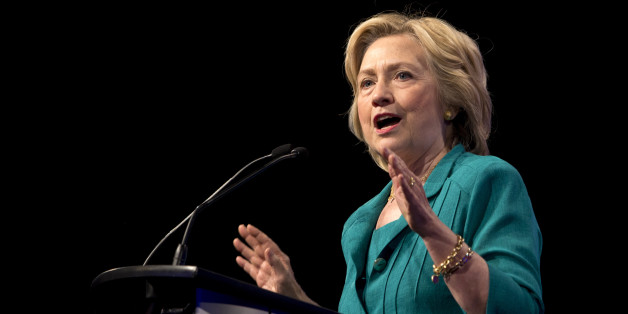 Democratic presidential candidate Hillary Rodham Clinton speaks before the National Urban League, Friday, July 31, 2015, in Fort Lauderdale, Fla. The State Department is releasing fewer-than-expected numbers of Hillary Rodham Clintonâs emails. It says the process is slower because of intense scrutiny by U.S. intelligence agencies to ensure that emails from her private server donât contain any sensitive or classified government secrets. (AP Photo/Wilfredo Lee)