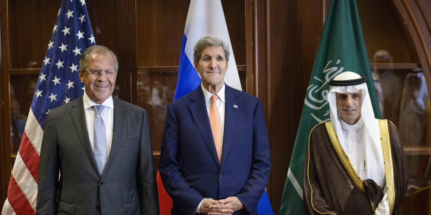 Russia's Foreign Minister Sergey Lavrov, left, US Secretary of State John Kerry, center, and Saudi Foreign Minister Adel al-Jubeir stand together before a trilateral meeting on Monday, Aug. 3, 2015 in Doha, Qatar. Kerry is meeting his Gulf Arab counterparts for talks in Qatar as he attempts to ease the concerns of key allies over the Iran nuclear deal. (Brendan Smialowski/Pool photo via AP)