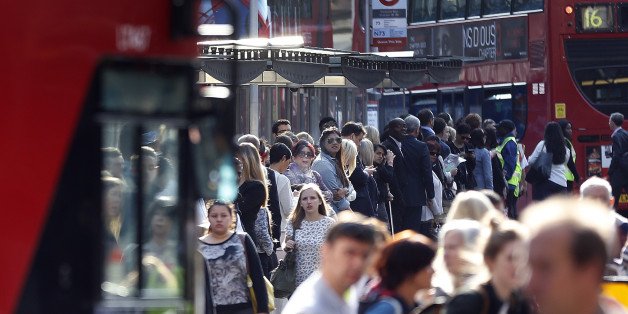 Commuters queue for buses as tube drivers are on strike in London, Thursday, July 9, 2015. Drivers and station staff were walking out for 24 hours from 6:30 p.m. (1730GMT) Wednesday in a dispute over pay and schedules when a 24-hour subway service starts on some lines later this year.The Underground handles 4 million journeys a day, and the strike by members of four unions will likely paralyze the capital's transport system, despite extra bus and river services. (AP Photo/Frank Augstein)
