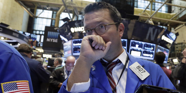 Un trader à la bourse de New York attentif à l'évolution des cours pétrolier. (AP Photo/Richard Drew)