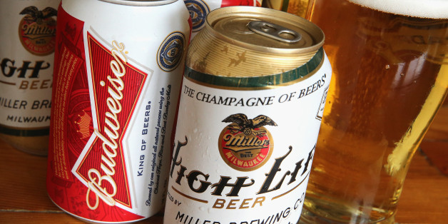 CHICAGO, IL - SEPTEMBER 15: In this photo illustration, cans of Miller High Life and Budweiser beer that are products of SABMiller and Anheuser-Busch InBev (respectively) are shown on September 15, 2014 in Chicago. Illinois. Shares of SABMiller have surged to an all-time high today on speculation of a takeover bid by Anheuser-Busch InBev, the world's largest brewer. (Photo Illustration by Scott Olson/Getty Images)