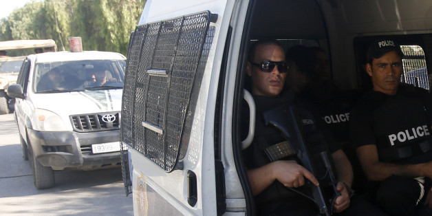 Tunisian police patrol near the attacked Imperial Marhaba hotel in Sousse, Tunisia, Saturday, June 27, 2015. The morning after a lone gunman killed dozens of people at a beach resort in Tunisia, busloads of tourists are heading to the nearby Enfidha-Hammamet airport hoping to return to their home countries. (AP Photo/Darko Vojinovic)