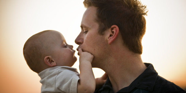 Father Kissing Baby