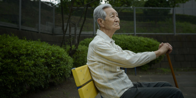 An old man is absent in the park .