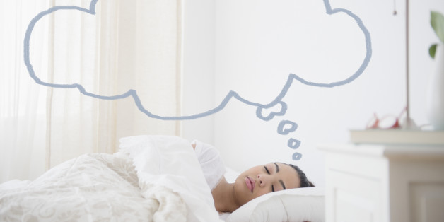 Hispanic woman sleeping with empty thought bubble