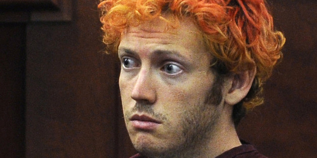 FILE - In this July 23, 2012, file photo, James Holmes, who is charged with killing 12 moviegoers and wounding 70 more in a shooting spree in a crowded theatre in 2012, sits in Arapahoe County District Court in Centennial, Colo. Jurors in the Colorado theater shooting case reached a decision Friday, Aug. 7, 2015, on whether Holmes should be sentenced to life in prison or the death penalty. The same jurors rejected Holmes' insanity defense and convicted him of murder.(RJ Sangosti/The Denver Post