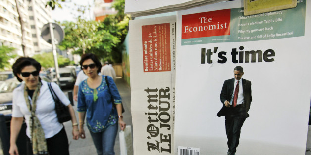 U.S. Presidential candidate Sen. Barack Obama is seen on the cover of The Economist magazine, on display at a kiosk in the Hamra district, Beirut, Lebanon, Tuesday, Nov. 4, 2008. The race for the White House is attracting huge media coverage in Lebanon, as the long race for the White House nears its end on Tuesday. (AP Photo/Hussein Malla)