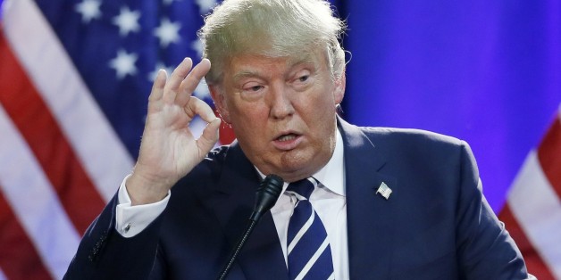Republican presidential candidate Donald Trump addresses a GOP fundraising event, Tuesday, Aug 11, 2015, in Birch Run, Mich. Trump attended the Lincoln Day Dinner of the Genesee and Saginaw county Republican parties. (AP Photo/Carlos Osorio)