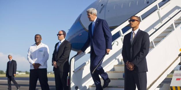 Secretary of State John Kerry arrives at Jose Marti International Airport in Havana, Cuba, Friday, Aug. 14, 2015. Kerry traveled to the Cuban capital to raise the U.S. flag and formally reopen the long-closed U.S. Embassy. Cuba and U.S. officially restored diplomatic relations July 20, as part of efforts to normalize ties between the former Cold War foes. (AP Photo/Pablo Martinez Monsivais,Pool)