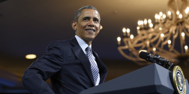 President Barack Obama mimics a dance that a woman was doing as she asked him a question during the Young African Leaders Initiative (YALI) Mandela Washington Fellowship Presidential Summit in Washington, Monday, Aug. 3, 2015. (AP Photo/Susan Walsh)