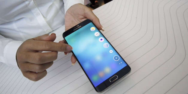 A product expert demonstrates the Samsung Galaxy S6 Edge Plus during a presentation, Thursday, Aug. 13, 2015, at Lincoln Center in New York. (AP Photo/Mary Altaffer)