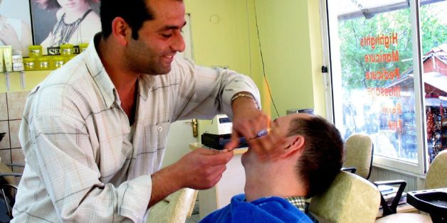 Famous Turkish shave! To finish off after a thorough shave, the "Kuaför" (barber) sets a large cotton bud on fire and burns the small hairs in and around the ear.