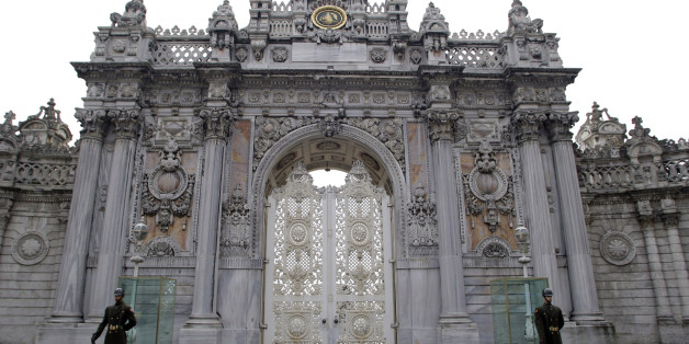 Turkish soldiers stand at the entrance of the Ottoman-era Dolmabahce Palace in Istanbul, Turkey, Tuesday, Feb. 23, 2010. Prosecutors on Tuesday interrogated 51 Turkish military commanders, including former Air Force and Navy chiefs, all detained Monday, in Istanbul, over alleged plans to destabilize the country by blowing up mosques to trigger a coup and topple the Islamic-rooted government.(AP Photo/Ibrahim Usta)
