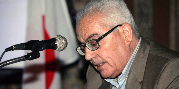 In this undated photo released Tuesday, Aug. 18, 2015 by the Syrian official news agency SANA, one of Syria's most prominent antiquities scholars, Khaled al-Asaad, speaks in Syria. Islamic State militants beheaded al-Asaad in the ancient town of Palmyra, Syria, then strapped his body to one of the town's Roman columns, Syrian state media and an activist group said Wednesday. The killing of 81-year-old al-Asaad was the latest atrocity perpetrated by the militant group, which has captured a third