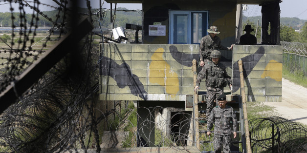 South Korean army soldiers step down from a military post guard near the demilitarized zone between the two Koreas in Paju, South Korea, Sunday, May 10 , 2015. North Korea said Saturday that it successfully test-fired a newly developed ballistic missile from a submarine in what would be the latest display of the country's advancing military capabilities. Hours after the announcement, South Korean officials said the North fired three anti-ship cruise missiles into the sea off its east coast.(AP Photo/Ahn Young-joon)