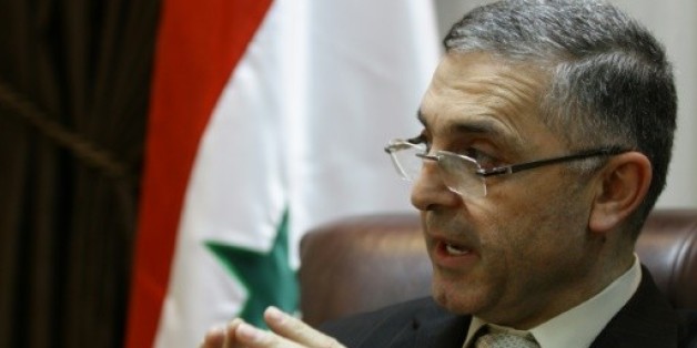 Le ministre syrien de la Réconciliation, Ali Haïdar, lors d'une interview à Damas le 11 février 2014