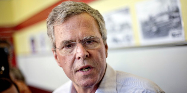 Republican presidential candidate, former Florida Gov. Jeb Bush talks to reporters at The Varsity restaurant during a campaign stop Tuesday, Aug. 18, 2015, in Atlanta. (AP Photo/David Goldman)
