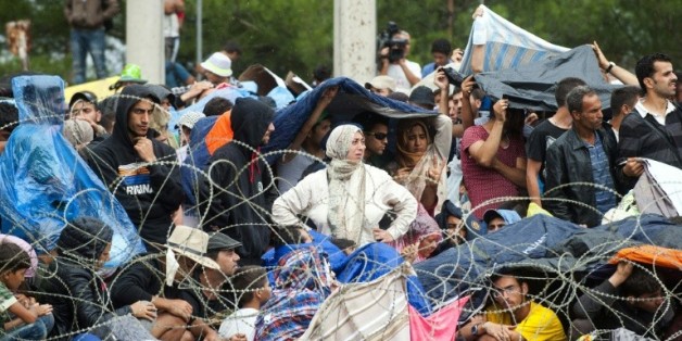 Des réfugiés et des migrants à la frontière gréco-macédonienne, le 22 août 2015 à Gevgelija