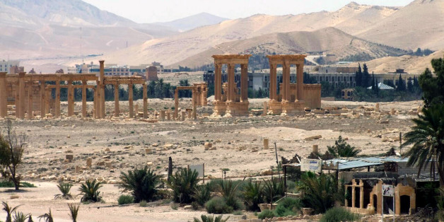 FILE - This file photo released on Sunday, May 17, 2015, by the Syrian official news agency SANA, shows the general view of the ancient Roman city of Palmyra, northeast of Damascus, Syria. Activists say Islamic State militants have destroyed a temple at Syria's ancient ruins of Palmyra. News that the militants blew up the Baalshamin Temple came after the extremists beheaded Palmyra scholar Khaled al-Asaad on Tuesday, hanging his bloodied body from a pole in the town's main square. (SANA via AP, File)