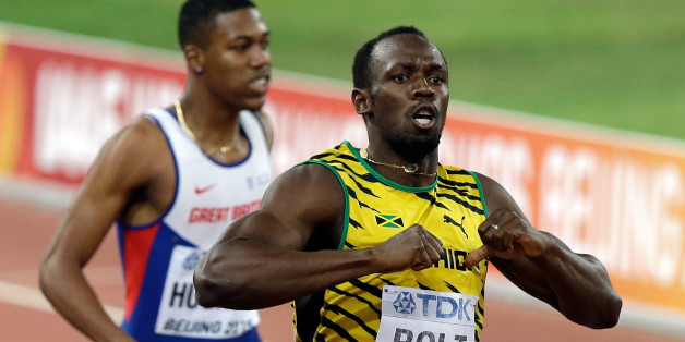 Jamaica's Usain Bolt celebrates after winning the gold in the men's 200m final at the World Athletics Championships at the Bird's Nest stadium in Beijing, Thursday, Aug. 27, 2015. (AP Photo/Darron Cummings)