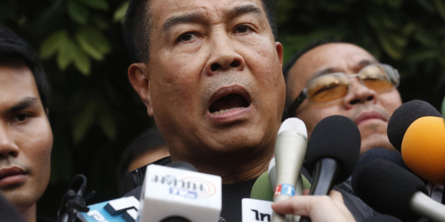 Thai police chief Somyot Pumpunmuang talks to reporters outside of an apartment on the outskirts of Bangkok, Thailand on Saturday, Aug. 29, 2015. Thai authorities raided an apartment in suburban Bangkok and arrested a foreigner Saturday with a fake Turkish passport and bomb-making materials, the first possible breakthrough in the deadly bombing at a Bangkok shrine nearly two weeks ago.(AP Photo/Sakchi Lalit)