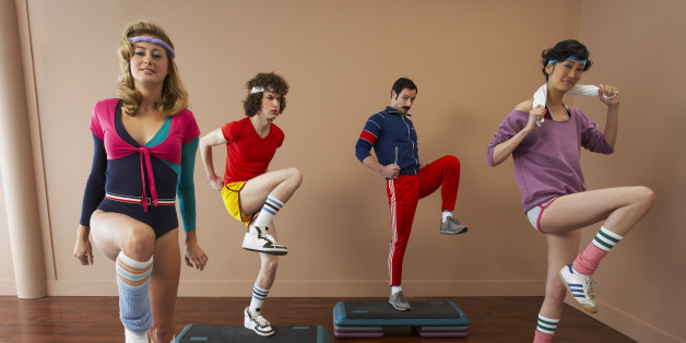 People in 1970's Clothing Exercising