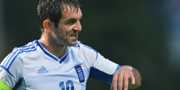 Greece's Georgios Karagkounis reacts during a friendly soccer match between Greece and Armenia in Kufstein, Austria, Thursday, May 31, 2012. (AP Photo/ Kerstin Joensson)