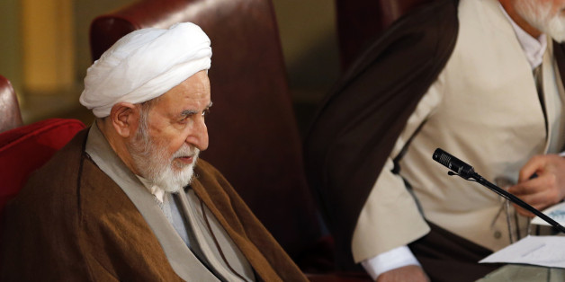 Newly elected chairman of the Iran's Assembly of Experts Ayatollah Mohammad Yazdi sits in a biannual meeting of the assembly in Tehran, Iran, Tuesday, March 10, 2015. Iran's most influential clerical body charged with choosing or dismissing the nation's supreme leader has elected a hard-line ayatollah as its new chairman, the official IRNA news agency reported on Tuesday. IRNA said Mohammad Yazdi, the deputy chairman of the 86-member Assembly of Experts, got 47 votes in his favor from among 73 c