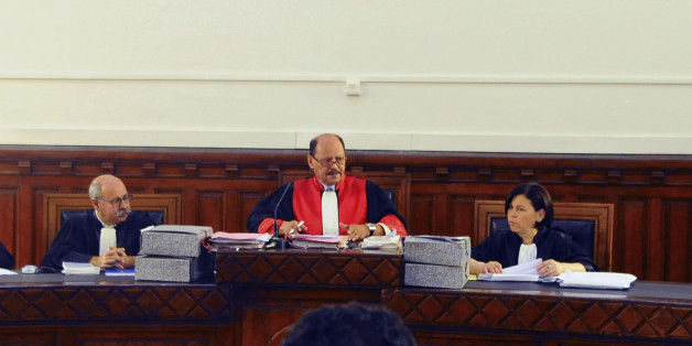Judge Touhami Hafi, centre, chairs the Tunis Criminal Court, in Tunis, Monday, June 20, 2011, for the hearing of the two embezzlement cases of money laundering and drug trafficking, against Zine El Abidine Ben Ali , Tunisia's former autocratic ruler. Tunisia's former autocratic ruler, whose ouster triggered a series of Arab world uprisings, went on trial in absentia Monday in the first of what will likely be a long series of court proceedings five months after he went into exile. The Tunis Crimi