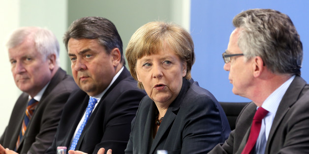 CSU-Chef Horst Seehofer, SPD-Chef Sigmar Gabriel, CDU-Chefin Angela Merkel und ihr Innenminister Thomas de Maizière (von links)