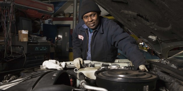 Mechanic fixing car