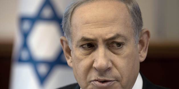 Israeli Prime Minister Benjamin Netanyahu chairs the weekly cabinet meeting at his office in Jerusalem, Sunday, Sept. 6, 2015. (Menahem Kahana/Pool photo via AP)