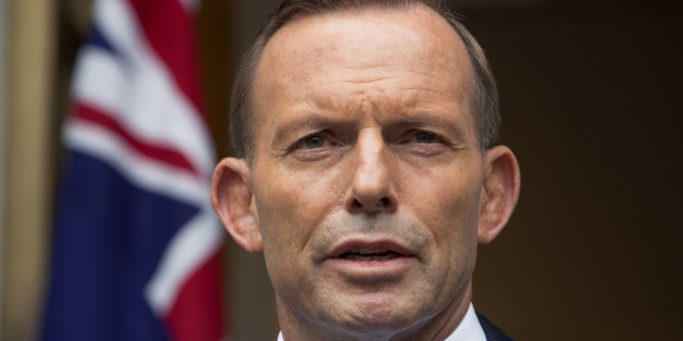 FILE - In this Feb. 9, 2015, file photo, Australian Prime Minister Tony Abbott answers questions at a media conference before attending the parliament's question time in Canberra, Australia. Abbott urged European leaders on Tuesday, April 21, 2015, to adopt tougher border control measures in the wake of the feared drowning of as many as 900 asylum seekers whose boat capsized off the coast of Libya. (AP Photo/Andrew Taylor, File)