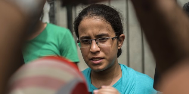 Egyptian student Mariam Malak, 19, talks to the media outside the Forensic Medical Authority headquarters in Cairo on September 8, 2015. Softly spoken schoolgirl Malak has become an unlikely symbol of the fight against corruption in Egypt after scoring the sum total of zero in her final exams. Now nicknamed the 'zero schoolgirl' in the local press, Malak had scored 97 percent in her previous two years. But Malak was shocked to find that she had been failed in her finals, and says her answers had