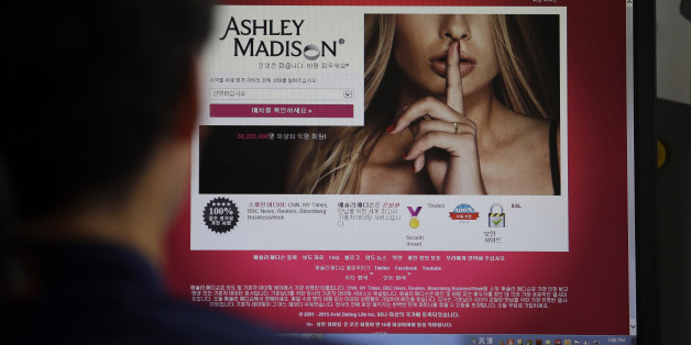 FILE - A June 10, 2015 photo from files showing Ashley Madison's Korean web site on a computer screen in Seoul, South Korea. Hackers claim to have leaked a massive database of users from Ashley Madison, a matchmaking website for cheating spouses. In a statement released Tuesday, Aug. 18, 2015, a group calling itself Impact Team said the site's owners had not bowed to their demands. "Now everyone gets to see their data," the statement said. (AP Photo/Lee Jin-man, File)