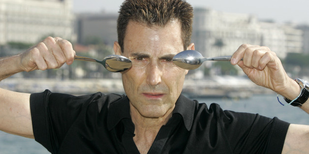 Israeli-British illusionist Uri Geller poses during the 24th MIPCOM (International Film and Program Market for Tv, Video,Cable and Satellite) in Cannes, southeastern France, Tuesday, Oct 14, 2008. (AP Photo/Lionel Cironneau)