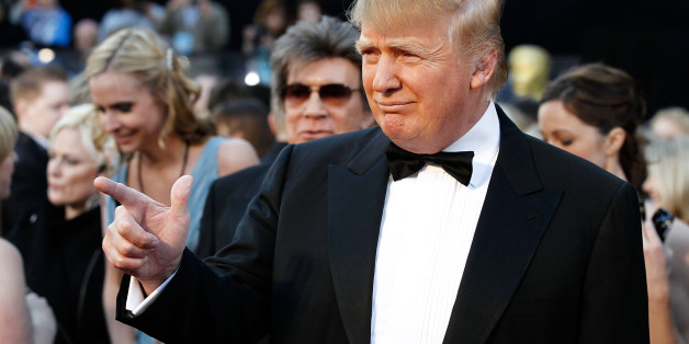 Donald Trump arrives before the 83rd Academy Awards on Sunday, Feb. 27, 2011, in the Hollywood section of Los Angeles. (AP Photo/Matt Sayles)