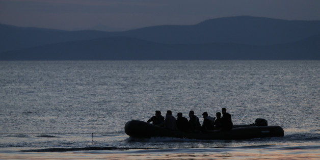 A dinghy with Syrian migrants is towed by a Greek coast guard patrol boat into the port of Kos, Greece, following a rescue operation in a part of the Aegean Sea between Turkey and Greece Sunday, May 31, 2015. Greece and Italy are the main points of entry into the European Union for refugees and economic migrants from the Middle East and Africa hoping to reach other European Union countries. (AP Photo/Petros Giannakouris)