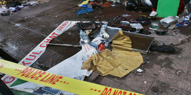 Utensils, footwear and other items are seen scattered inside a restaurant, one of the two Saturday's bombing sites in Hyderabad, India, Sunday, Aug. 26, 2007. Foreign Islamic extremists may have been behind a pair of bombings that tore through a popular restaurant and a park in a southern Indian city, killing at least 42 people, an official said Sunday. Saturday's attacks in Hyderabad were the latest in a series of bombings to hit India in the last year, nearly all of which have been blamed on Islamic extremists with foreign connections even when Muslims were targeted. "Available information points to the involvement of terrorist organizations based in Bangladesh and Pakistan," Y.S. Rajasekhara Reddy, chief minister of Andhra Pradesh state, where Hyderabad is located, told reporters after an emergency state Cabinet meeting. (AP Photo/Aijaz Rahi)