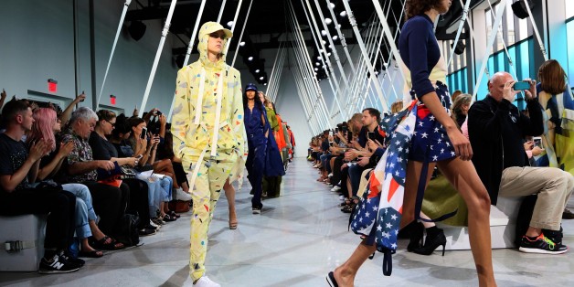 Models present designs by Lacoste during New York Fashion Week in New York on September 12, 2015. AFP PHOTO/TREVOR COLLENS (Photo credit should read TREVOR COLLENS/AFP/Getty Images)