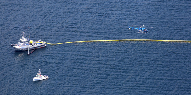 SANTA BARBARA, CALIFORNIA - MAY 20: Oil booms are deployed on the ocean as cleanup and containment effort continues on the beach in Santa Barbara, Calif., on May 20, 2015. (Brian van der Brug / Los Angeles Times via Getty Images)