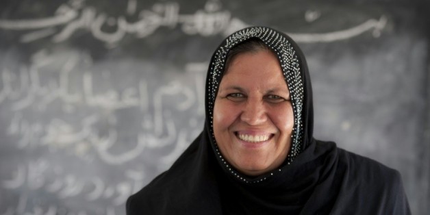 This handout picture taken and released on September 15, 2015 in Geneva by UNHCR show L’enseignante et réfugiée afghane Aqeela Asifi, le 15 septembre 2015, à Genève